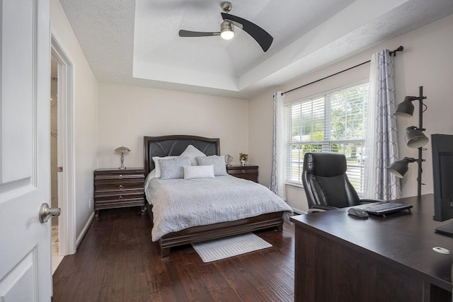 1077 Kathryn Rd, Mount Juliet, TN 37122 - bedroom featuring a tray ceiling, a desk, dark wood finished floors, baseboards, and a ceiling fan