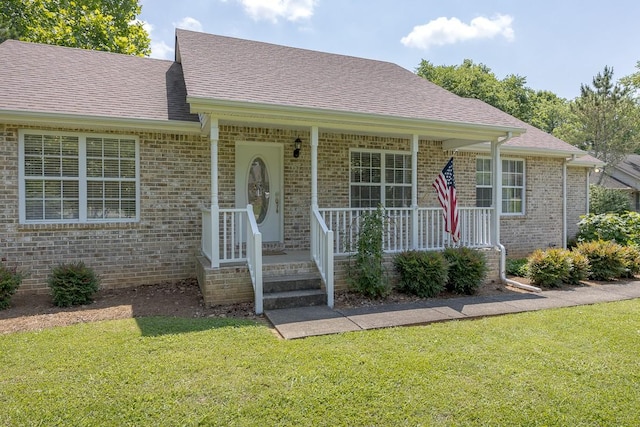 1077 Kathryn Rd, Mount Juliet, TN 37122 - view of front of property with brick siding, a front lawn, and roof with shingles