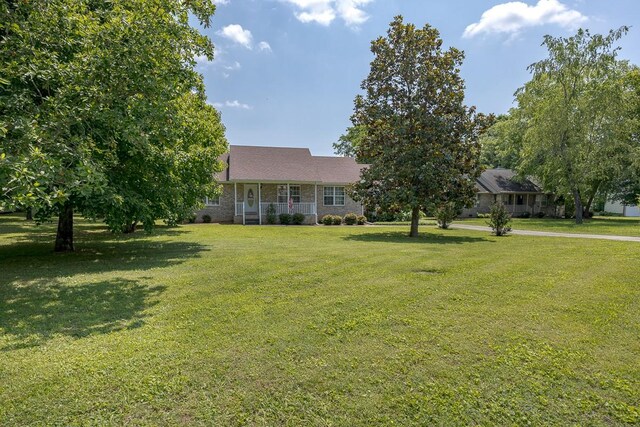 1077 Kathryn Rd, Mount Juliet, TN 37122 - view of front of home with a front lawn and a porch