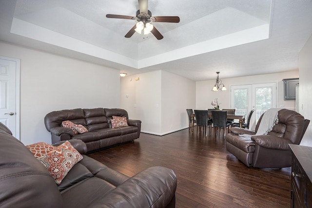1077 Kathryn Rd, Mount Juliet, TN 37122 - living room with a tray ceiling, wood-type flooring, baseboards, and ceiling fan