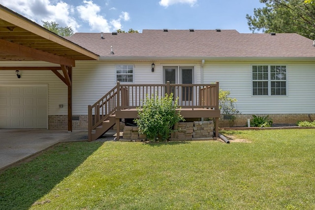 1077 Kathryn Rd, Mount Juliet, TN 37122 - back of house with a lawn, a wooden deck, a shingled roof, driveway, and a garage