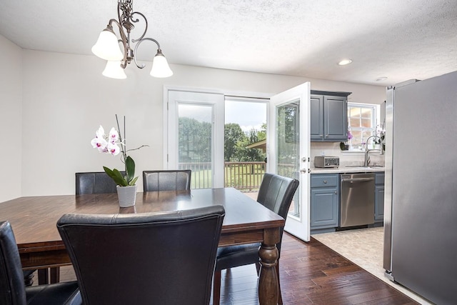 1077 Kathryn Rd, Mount Juliet, TN 37122 - dining room featuring a chandelier, dark wood-style floors, a textured ceiling, and recessed lighting