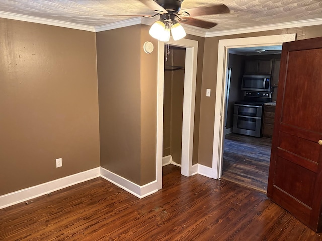117 Rob Rd, Clarksville, TN 37040 - empty room with baseboards, dark wood finished floors, a ceiling fan, ornamental molding, and a smoke detector