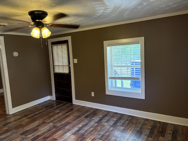 117 Rob Rd, Clarksville, TN 37040 - empty room with dark wood-style floors, baseboards, ceiling fan, and ornamental molding