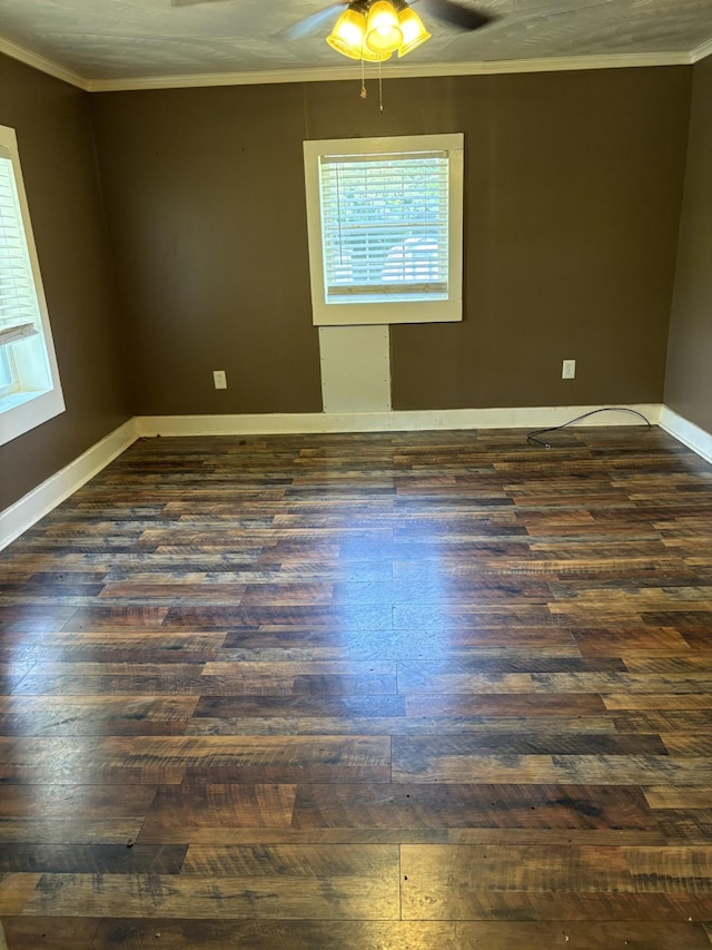 117 Rob Rd, Clarksville, TN 37040 - empty room with crown molding, dark wood-style flooring, ceiling fan, and baseboards