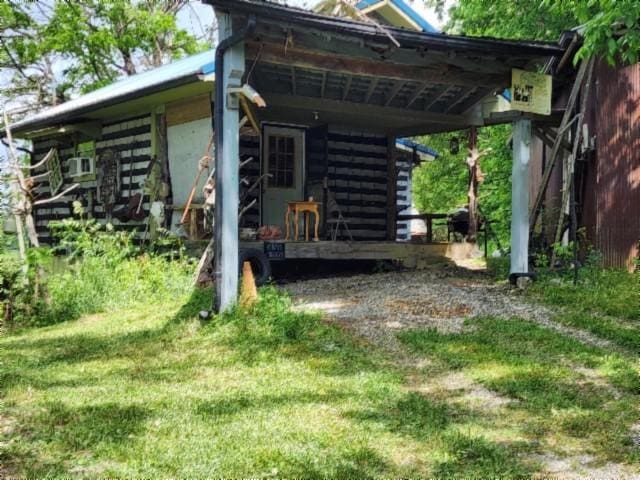 106 Log Home Ln, Moss, TN 38575 - back of property featuring a lawn