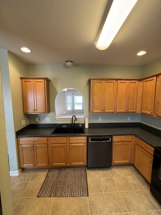 1101 Downs Blvd Unit 312, Franklin, TN 37064 - kitchen featuring dishwashing machine, a sink, range, brown cabinets, and recessed lighting