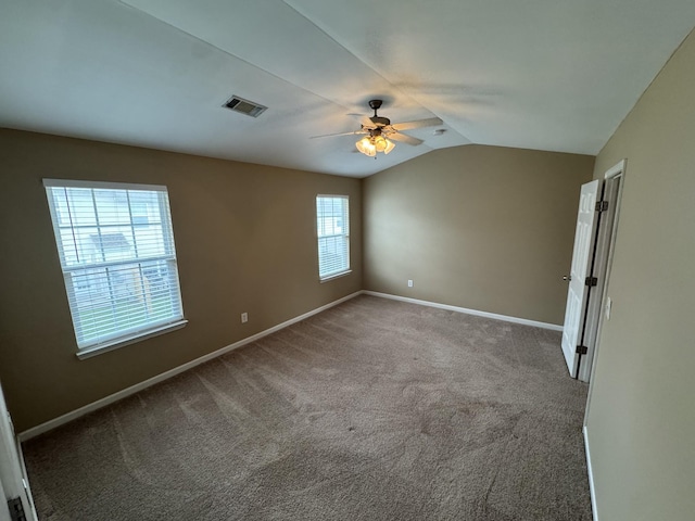 1101 Downs Blvd Unit 312, Franklin, TN 37064 - carpeted empty room featuring ceiling fan, vaulted ceiling, and baseboards