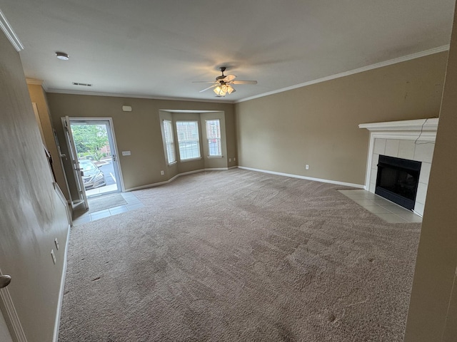 1101 Downs Blvd Unit 312, Franklin, TN 37064 - unfurnished living room featuring ceiling fan, carpet floors, crown molding, a fireplace, and baseboards