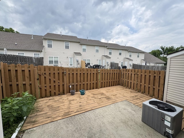 1101 Downs Blvd Unit 312, Franklin, TN 37064 - fenced backyard featuring a wooden deck, a residential view, and central AC