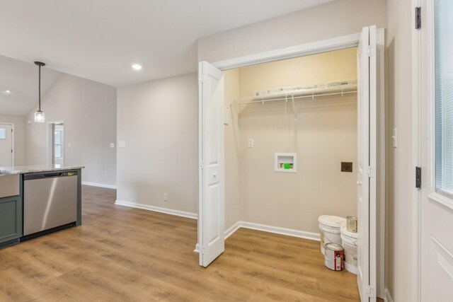 1445 Isaiah Dr, Clarksville, TN 37042 - washroom featuring hookup for a washing machine, light wood-type flooring, recessed lighting, and baseboards
