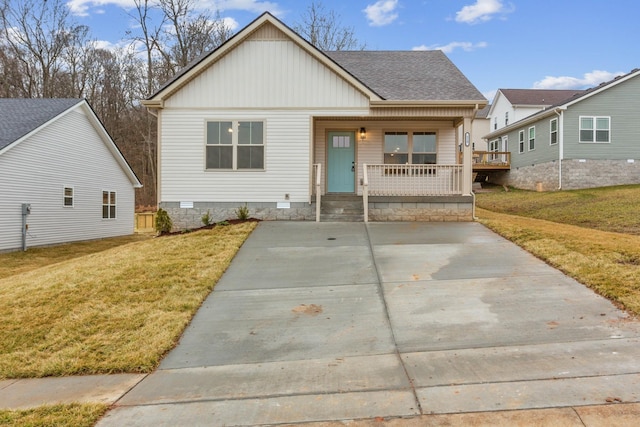 1445 Isaiah Dr, Clarksville, TN 37042 - bungalow with covered porch, crawl space, a front yard, and board and batten siding