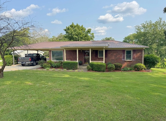 5288 Rudolph St, Springfield, TN 37172 - ranch-style home with brick siding, a front yard, metal roof, and concrete driveway