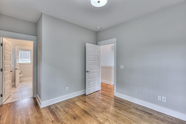 3104 Southlake Dr, Nashville, TN 37211 - unfurnished bedroom featuring baseboards and light wood-style floors