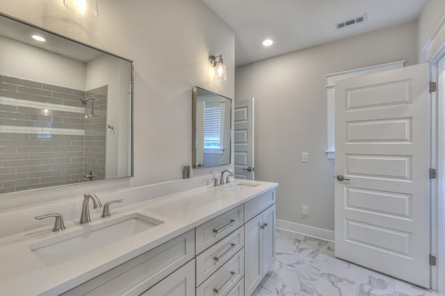 3104 Southlake Dr, Nashville, TN 37211 - full bathroom with marble finish flooring, double vanity, recessed lighting, and tiled shower