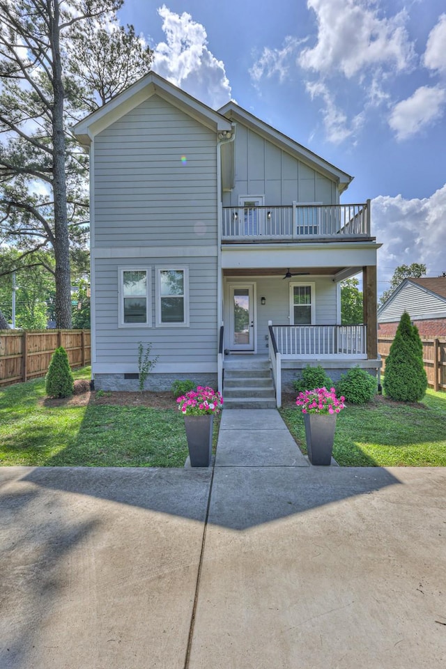 3104 Southlake Dr, Nashville, TN 37211 - view of front of house with a balcony, board and batten siding, and a porch