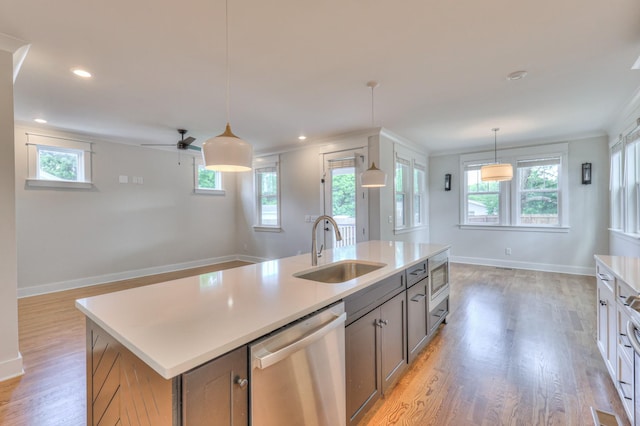 3104 Southlake Dr, Nashville, TN 37211 - kitchen with dishwasher, a sink, light wood-style flooring, baseboards, and crown molding