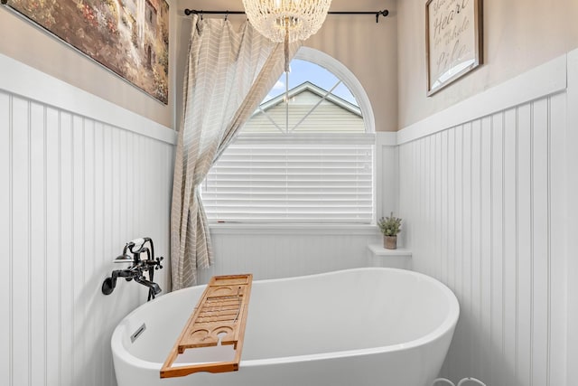 503 Hollyhock Way, Franklin, TN 37064 - full bathroom with a chandelier and a freestanding bath