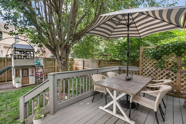 503 Hollyhock Way, Franklin, TN 37064 - wooden terrace with outdoor dining area and a fenced backyard