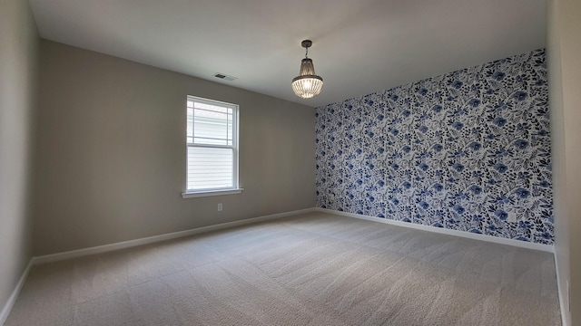 1060 Brayden Dr, Fairview, TN 37062 - carpeted empty room with baseboards and wallpapered walls