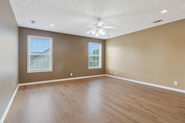 193 Red Jacket Trce, Murfreesboro, TN 37127 - spare room featuring ceiling fan, light wood finished floors, baseboards, a textured ceiling, and recessed lighting