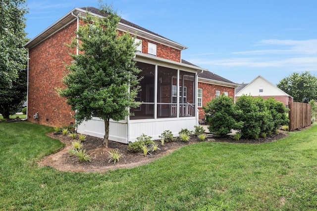 193 Red Jacket Trce, Murfreesboro, TN 37127 - view of home's exterior featuring a sunroom, a lawn, and brick siding