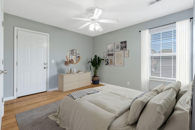 193 Red Jacket Trce, Murfreesboro, TN 37127 - bedroom with light wood-style flooring, a ceiling fan, and baseboards