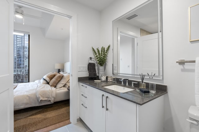 1212 Demonbreun St Unit A3 O, Nashville, TN 37203 - ensuite bathroom with vanity, tile patterned flooring, and toilet