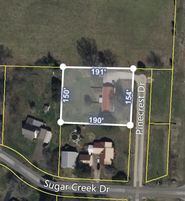 235 Pinecrest Dr, Henderson, TN 38340 - aerial map of property and surrounding area with property boundaries highlighted