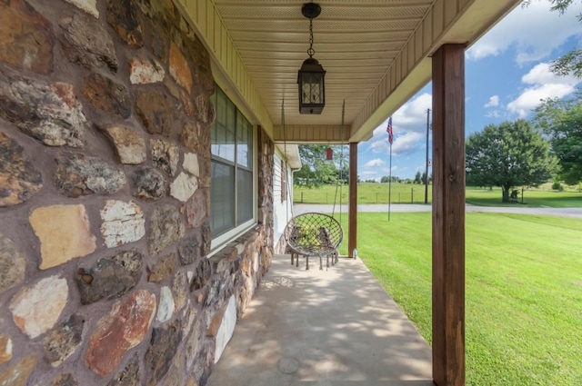 235 Pinecrest Dr, Henderson, TN 38340 - covered porch featuring a lawn