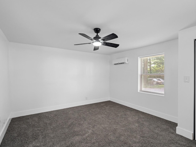400 Westover Dr, Columbia, TN 38401 - spare room with a wall mounted air conditioner, dark carpet, a ceiling fan, and baseboards