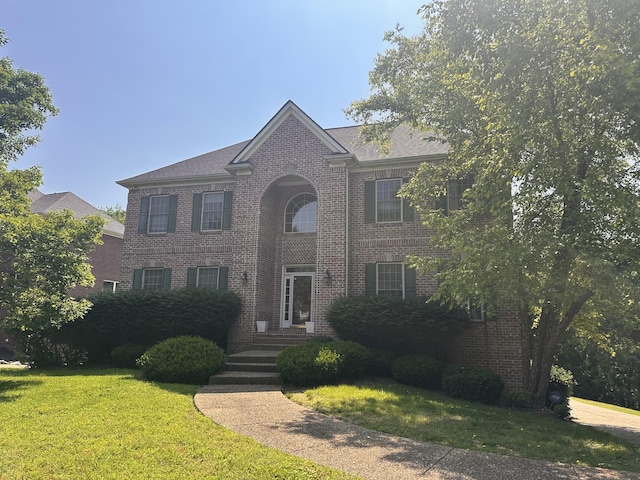 1230 Twelve Stones Xing, Goodlettsville, TN 37072 - view of front of property with a front lawn and brick siding