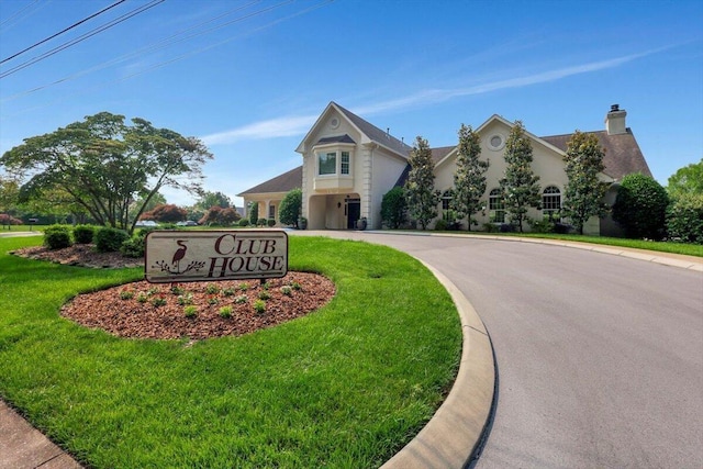 1284 Heritage Landing Dr, Chattanooga, TN 37405 - community sign featuring curved driveway and a lawn