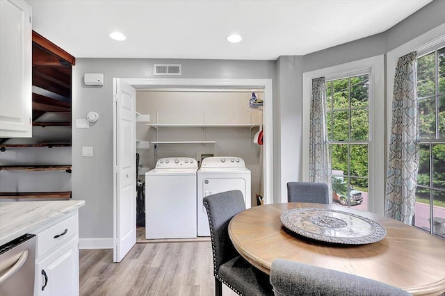 1284 Heritage Landing Dr, Chattanooga, TN 37405 - dining room featuring washing machine and clothes dryer, light wood finished floors, and recessed lighting