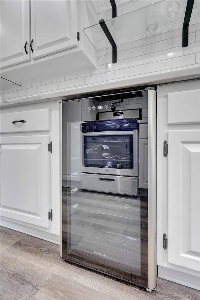1284 Heritage Landing Dr, Chattanooga, TN 37405 - kitchen view of white cabinets and wood finished floors