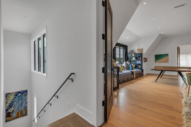 7313 Harlow Dr, College Grove, TN 37046 - hall featuring plenty of natural light, baseboards, light wood-style flooring, recessed lighting, and an upstairs landing