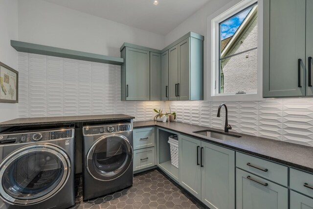 7313 Harlow Dr, College Grove, TN 37046 - washroom featuring washing machine and clothes dryer and cabinet space