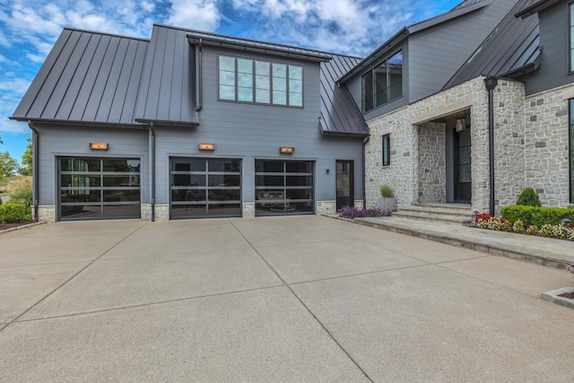 7313 Harlow Dr, College Grove, TN 37046 - view of building exterior with concrete driveway and an attached garage