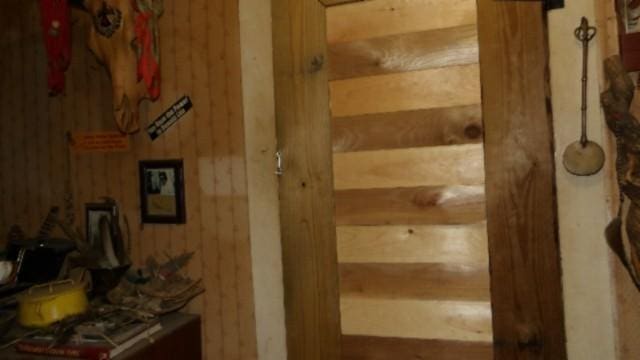 105 Log Home Ln, Moss, TN 38575 - corridor with wood walls