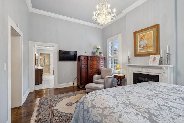 224 3rd Ave S, Franklin, TN 37064 - bedroom with crown molding, a chandelier, wood finished floors, baseboards, and a fireplace
