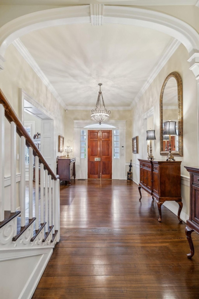 224 3rd Ave S, Franklin, TN 37064 - foyer featuring hardwood / wood-style floors, a chandelier, ornamental molding, arched walkways, and stairs