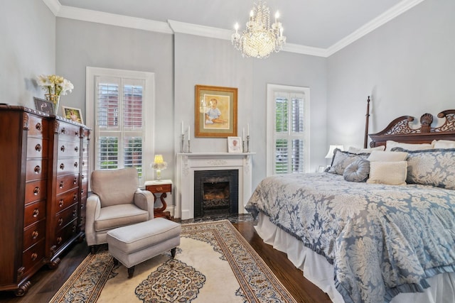 224 3rd Ave S, Franklin, TN 37064 - bedroom with wood finished floors, a chandelier, crown molding, and a fireplace with flush hearth