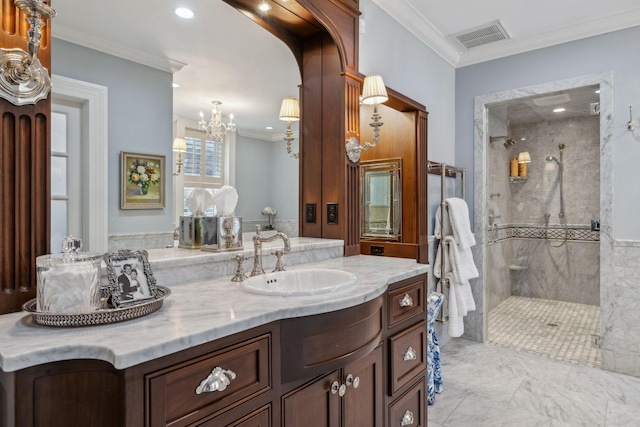 224 3rd Ave S, Franklin, TN 37064 - full bath with a marble finish shower, a chandelier, vanity, ornamental molding, and marble look tiles