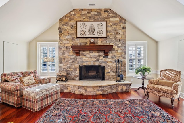 224 3rd Ave S, Franklin, TN 37064 - living room with wood finished floors, lofted ceiling, a stone fireplace, and healthy amount of natural light