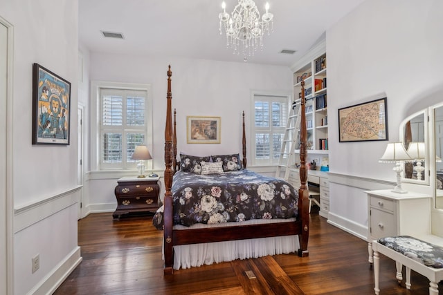 224 3rd Ave S, Franklin, TN 37064 - bedroom featuring wood finished floors, a chandelier, and baseboards
