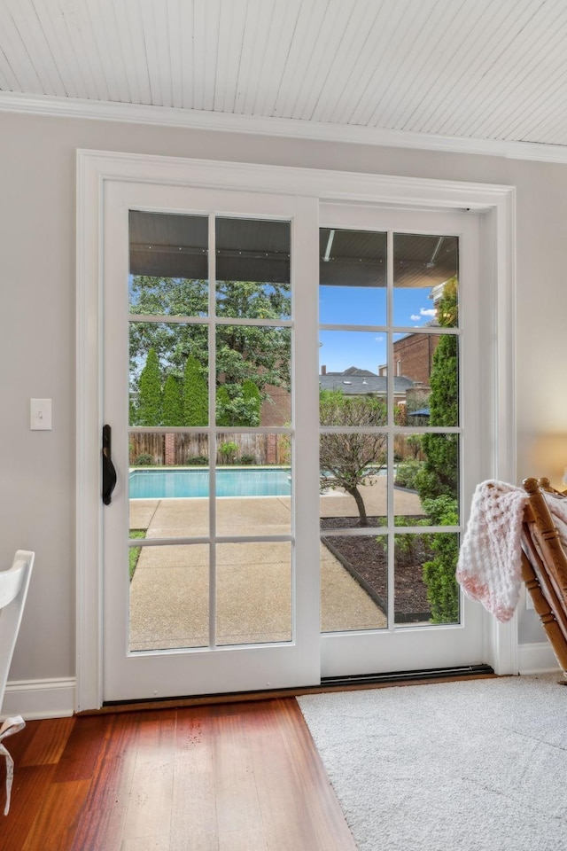 224 3rd Ave S, Franklin, TN 37064 - doorway to outside with wood finished floors, ornamental molding, and baseboards