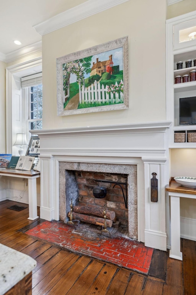 224 3rd Ave S, Franklin, TN 37064 - detailed view of ornamental molding, a fireplace with flush hearth, wood finished floors, and recessed lighting