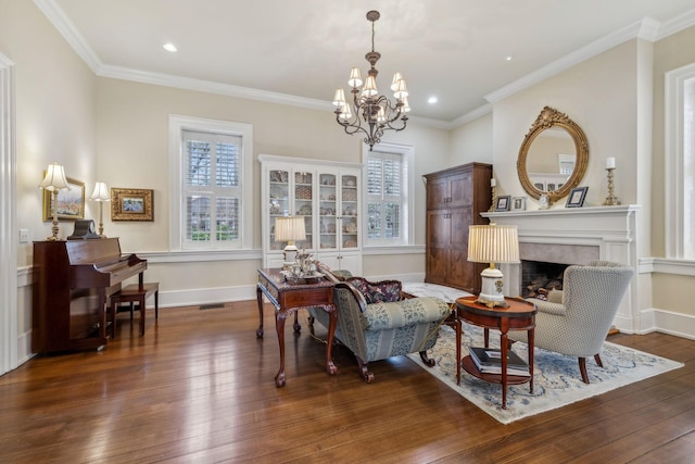 224 3rd Ave S, Franklin, TN 37064 - sitting room featuring a chandelier, wood finished floors, ornamental molding, a fireplace, and baseboards