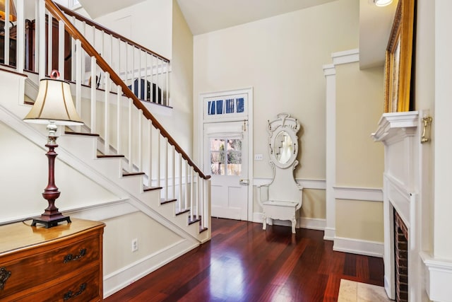 224 3rd Ave S, Franklin, TN 37064 - foyer with stairs, wood finished floors, and a brick fireplace