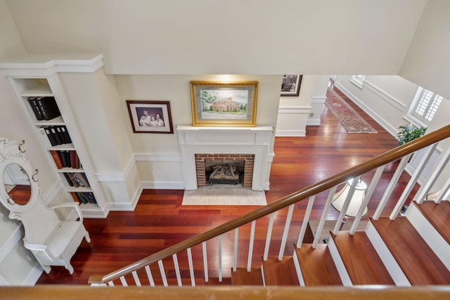 224 3rd Ave S, Franklin, TN 37064 - stairs featuring wood finished floors and a fireplace